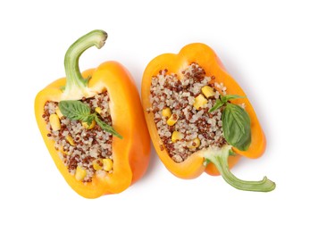 Photo of Quinoa stuffed bell pepper with basil isolated on white, top view