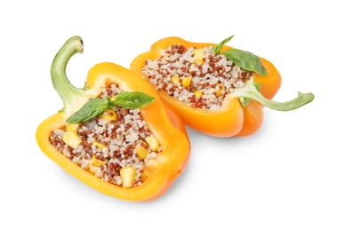 Photo of Quinoa stuffed bell pepper with basil isolated on white