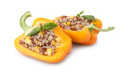 Photo of Quinoa stuffed bell pepper with basil isolated on white