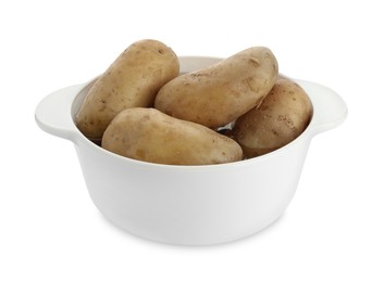 Photo of Raw potatoes in pot isolated on white