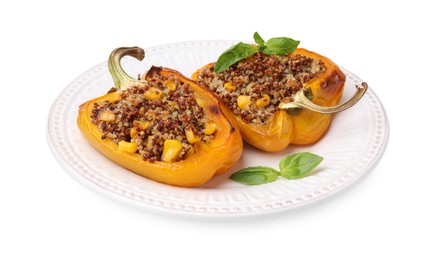 Photo of Quinoa stuffed bell peppers with corn and basil isolated on white