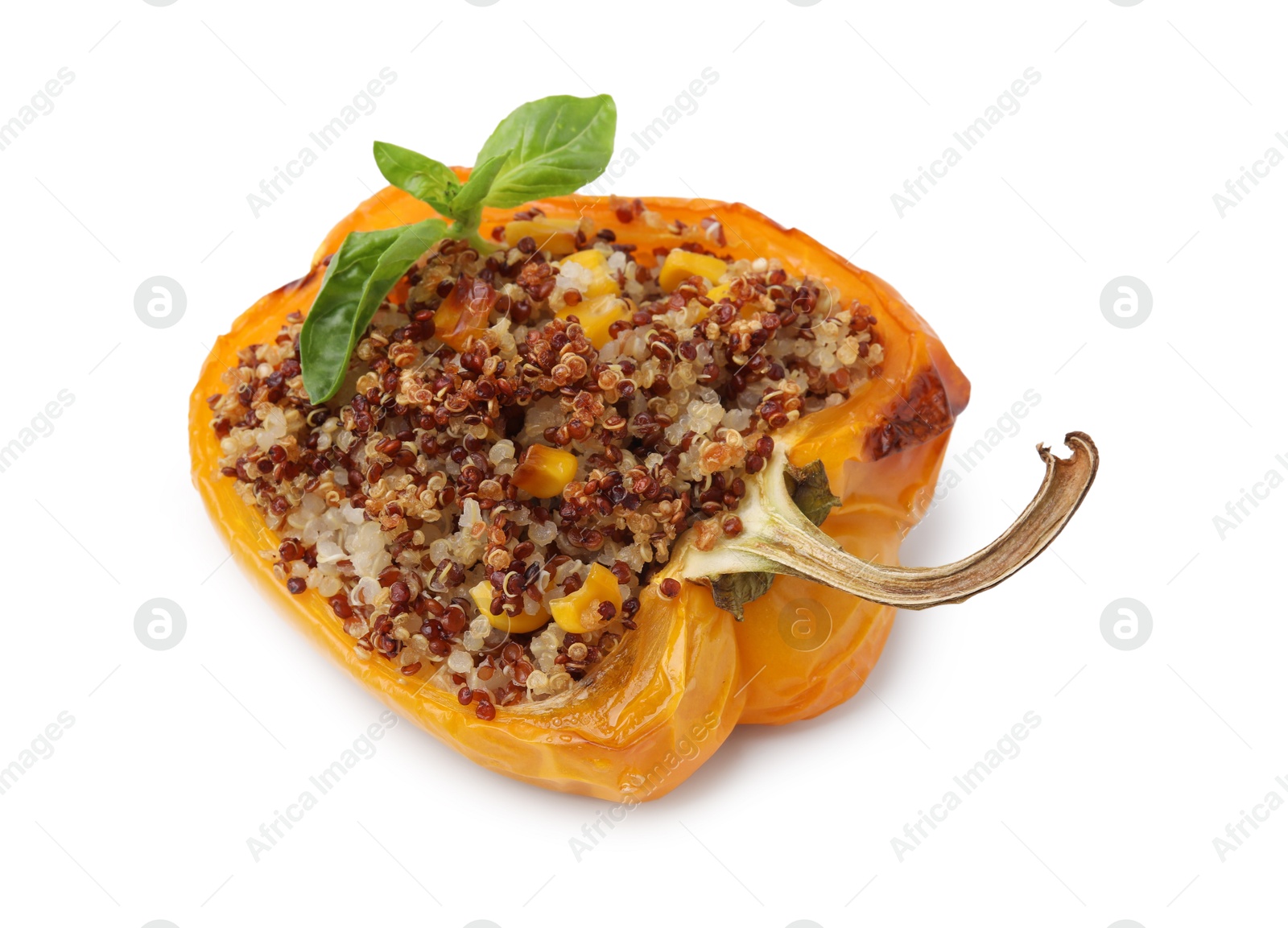 Photo of Quinoa stuffed bell pepper with corn and basil isolated on white