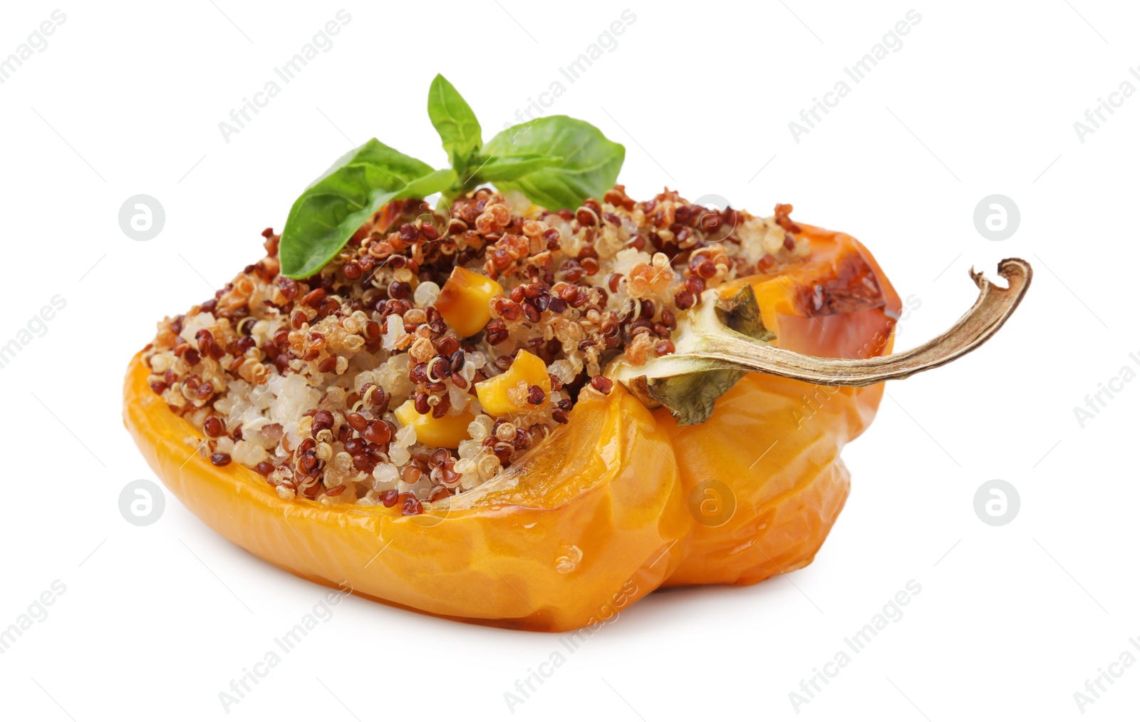 Photo of Quinoa stuffed bell pepper with corn and basil isolated on white