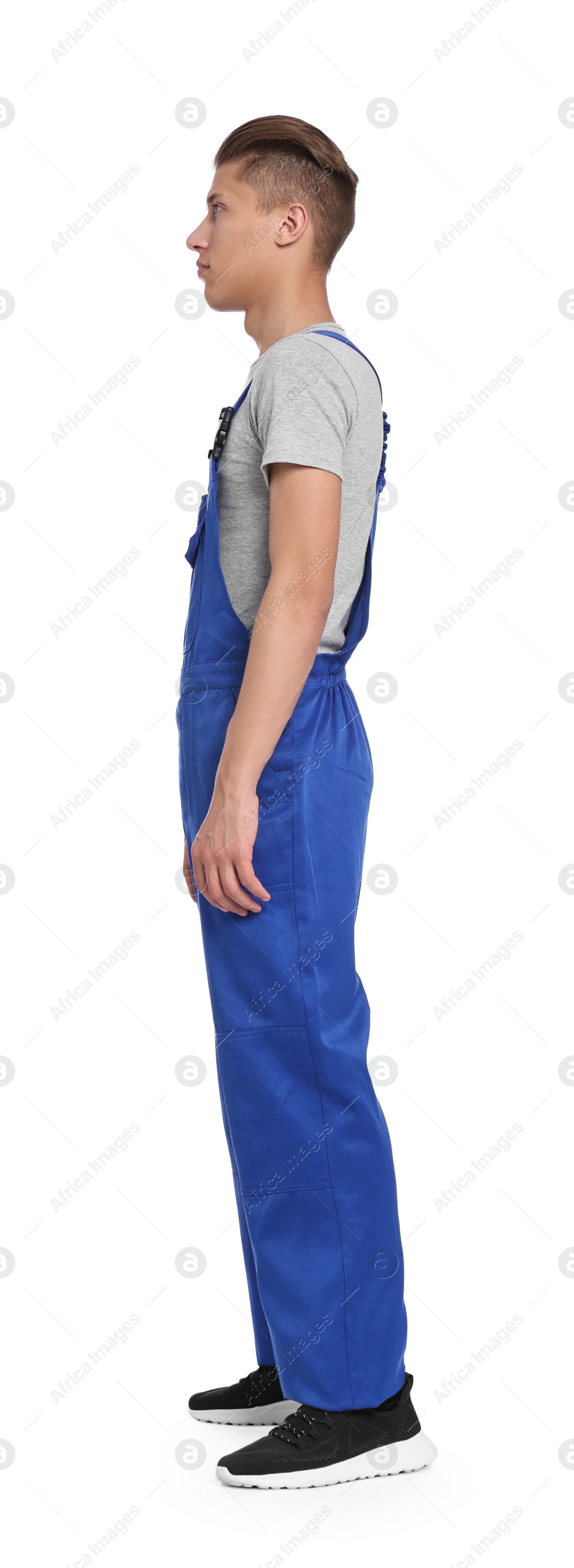 Photo of Auto mechanic in uniform on white background