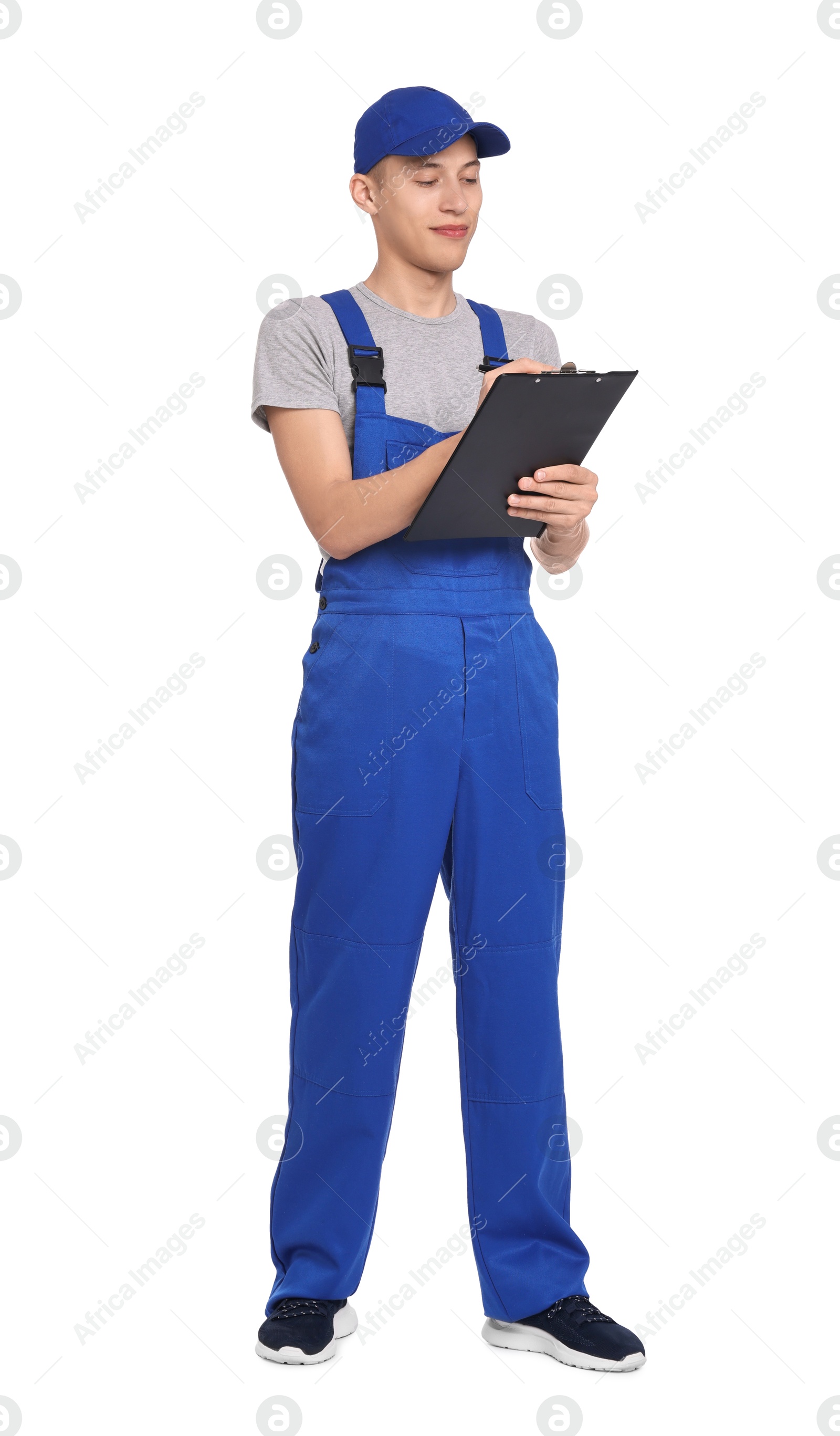 Photo of Auto mechanic working with clipboard on white background