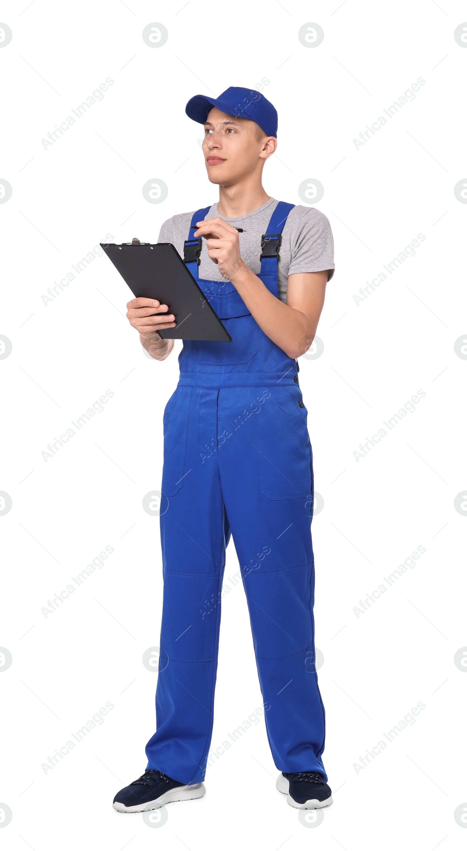 Photo of Auto mechanic working with clipboard on white background