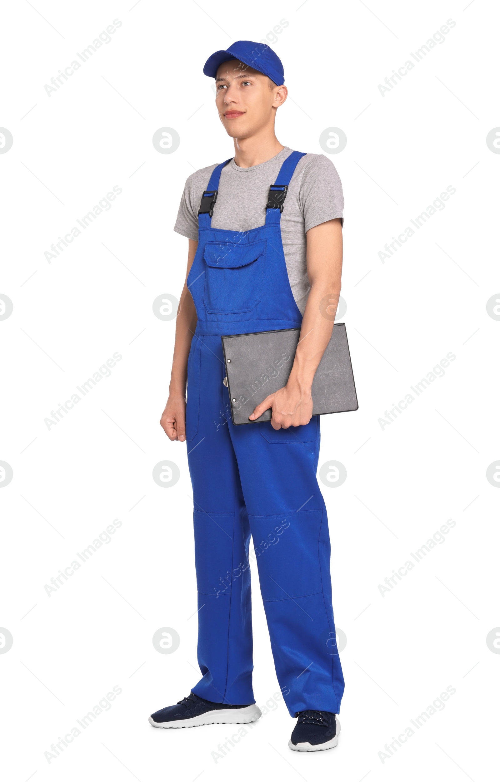 Photo of Auto mechanic with clipboard on white background