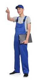 Photo of Auto mechanic with clipboard pointing at something on white background