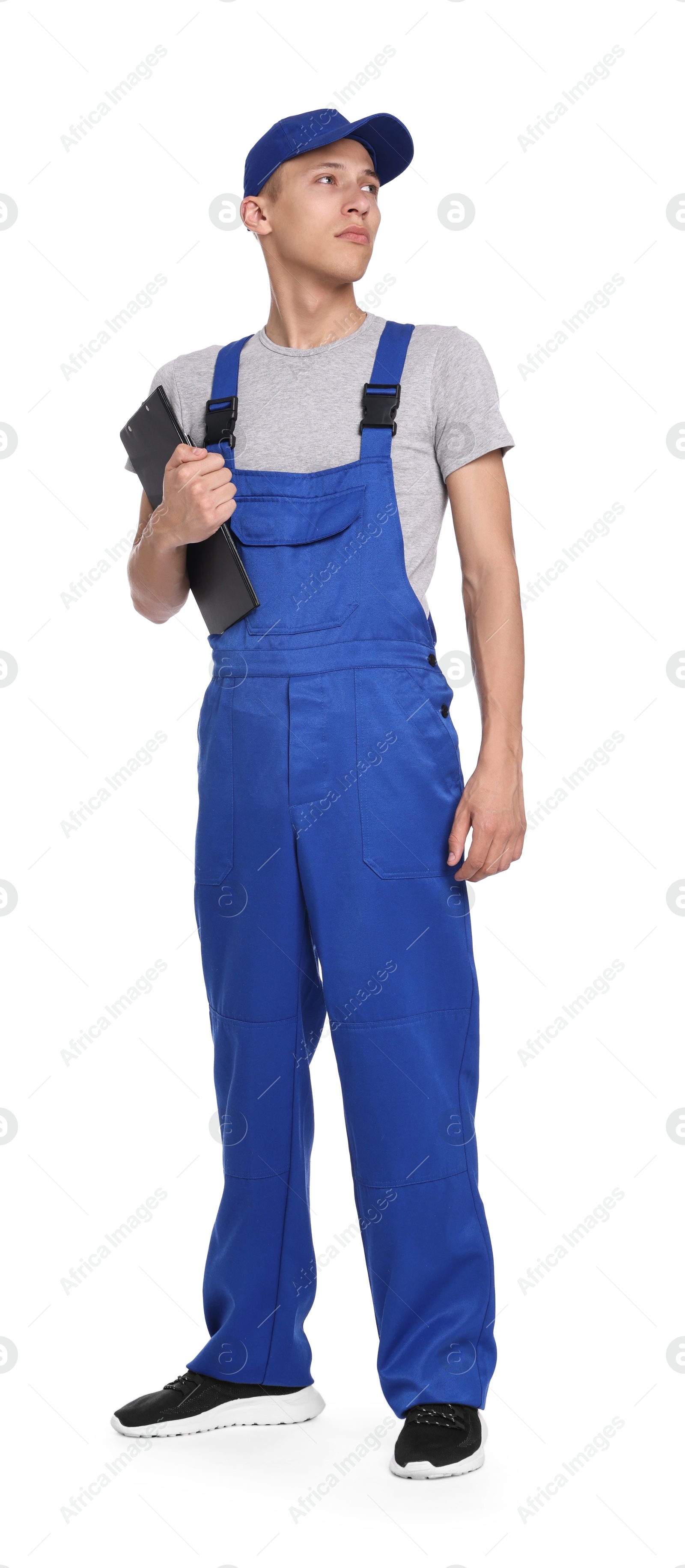 Photo of Auto mechanic with clipboard on white background
