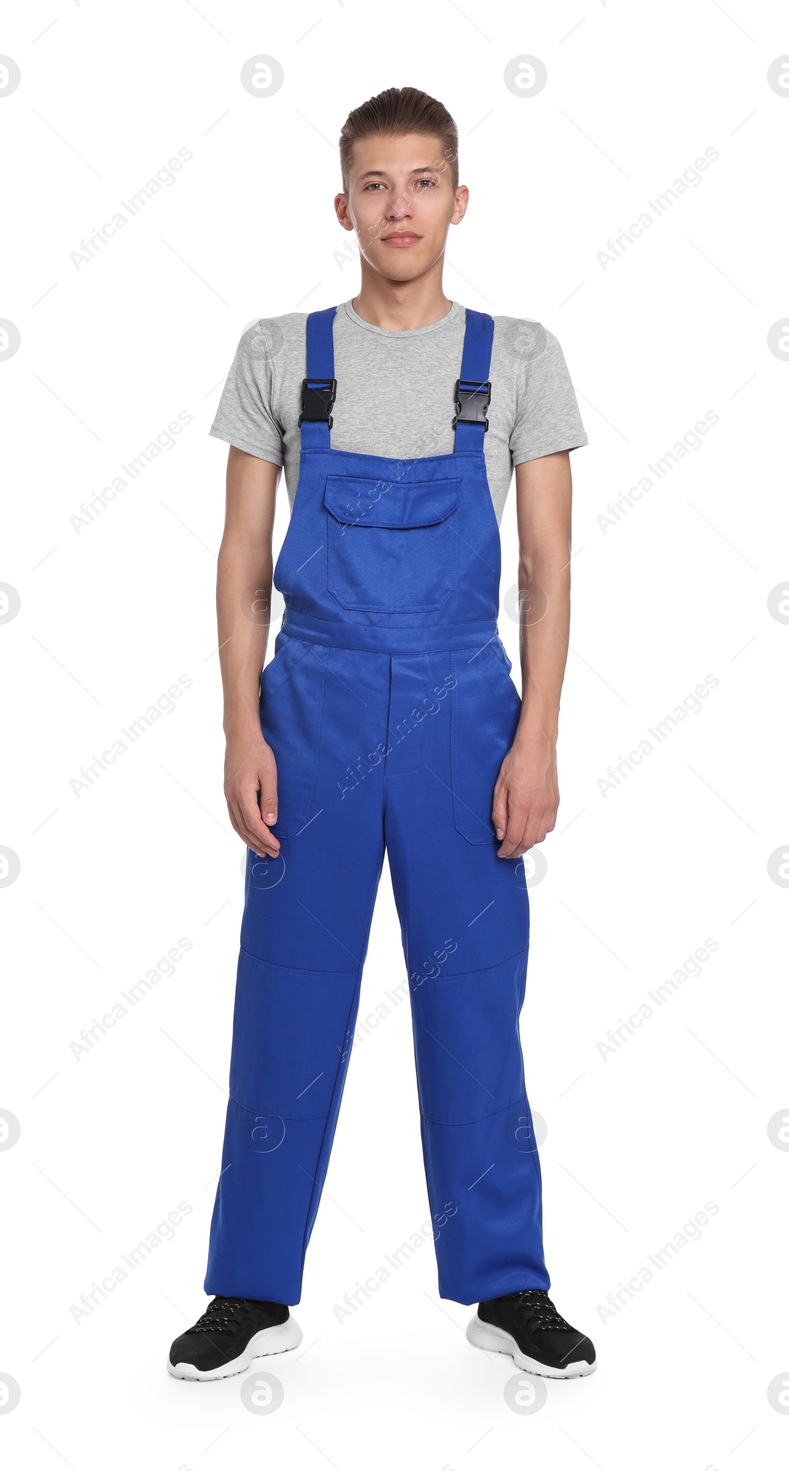 Photo of Auto mechanic in uniform on white background