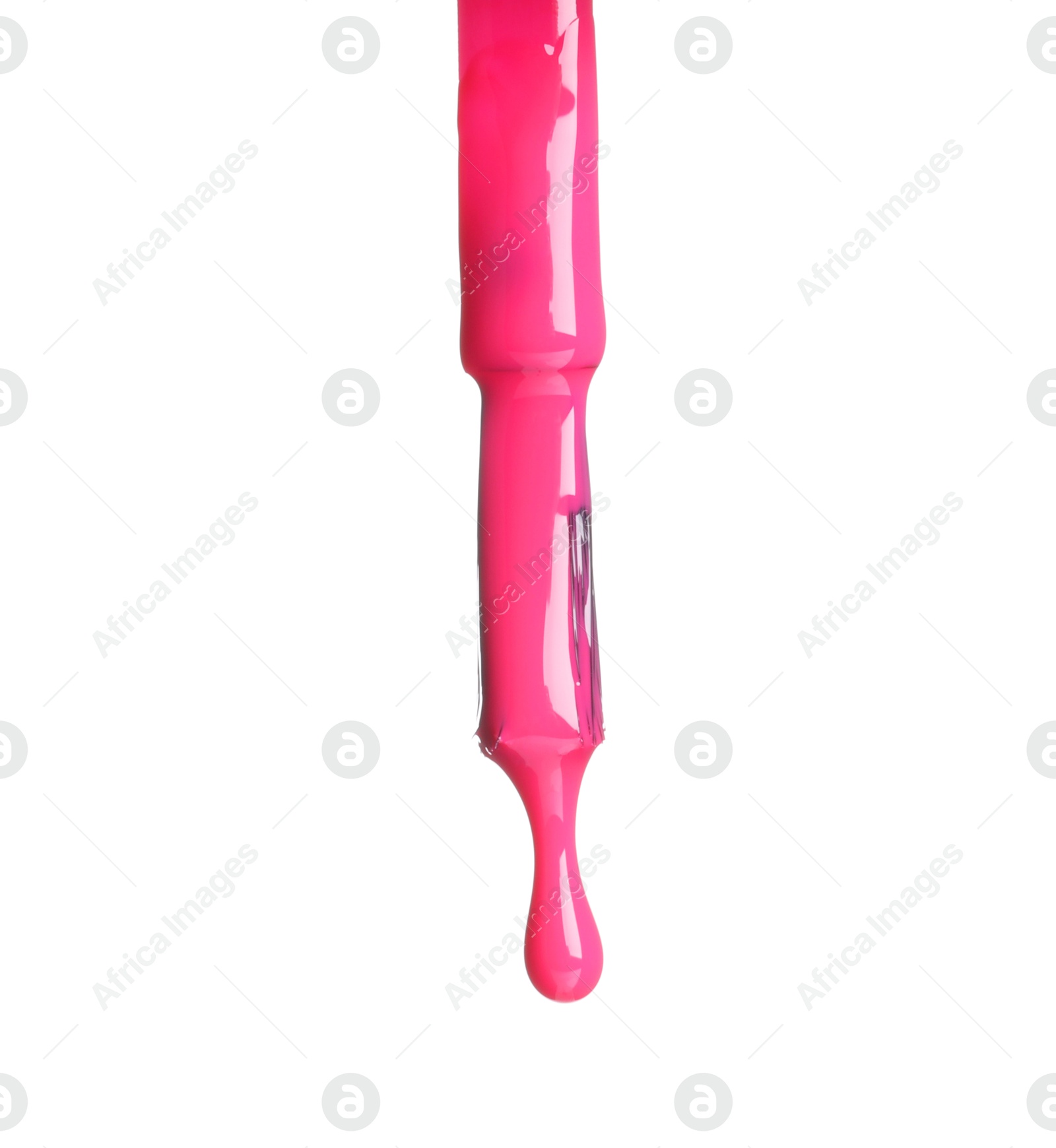 Photo of Pink nail polish dripping from brush isolated on white