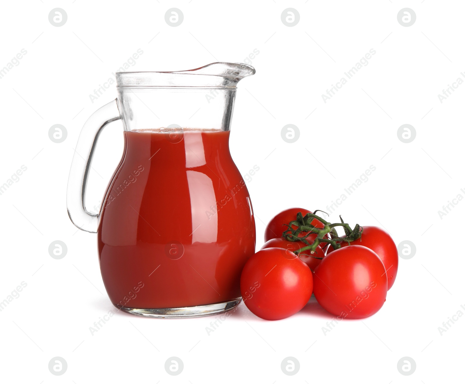 Photo of Tasty tomato juice in glass jug and fresh vegetables isolated on white