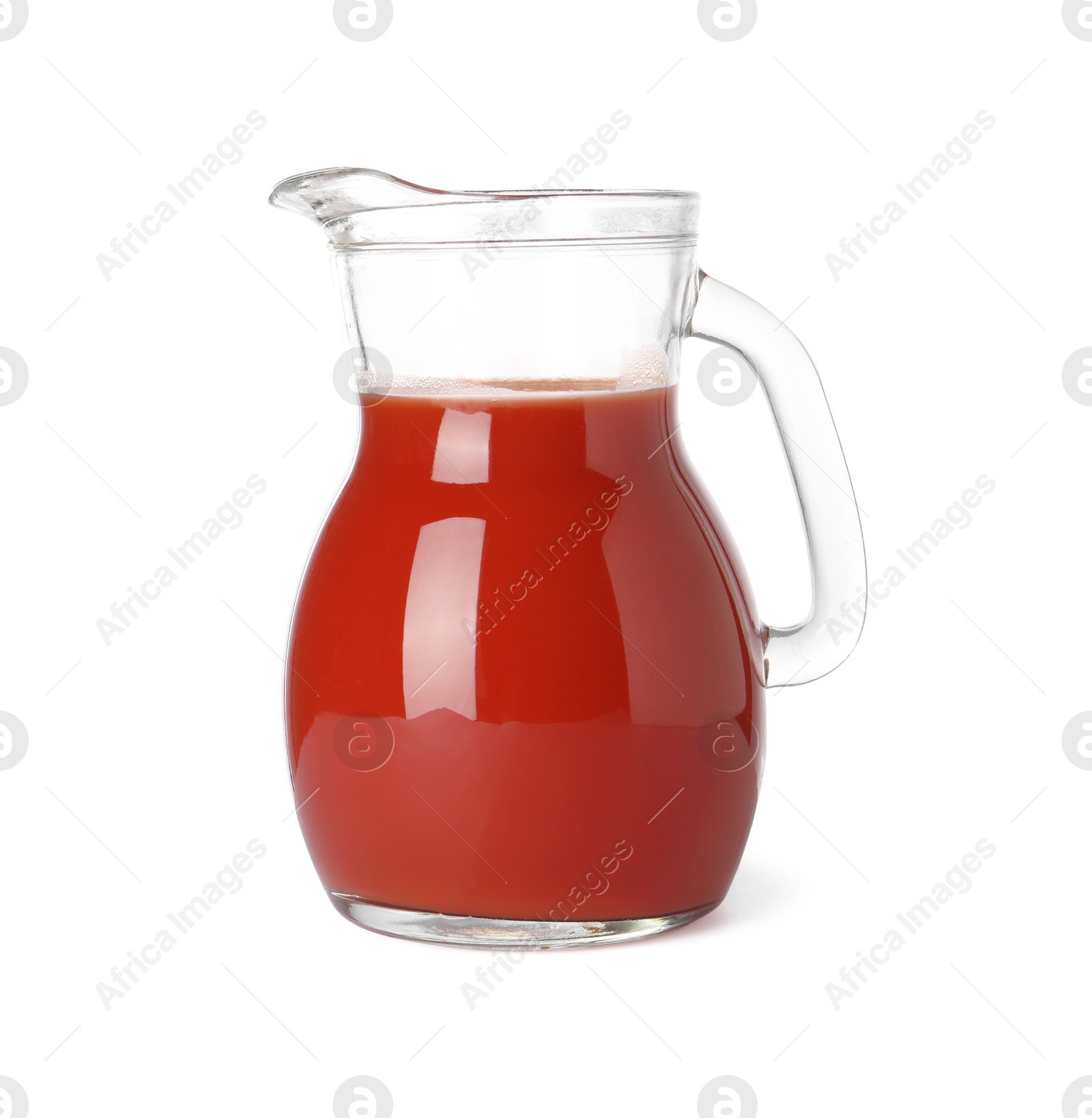 Photo of Fresh tomato juice in glass jug isolated on white