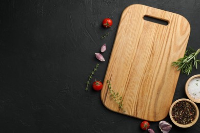 Photo of Cutting board, fresh tomatoes and different spices on grey textured table, flat lay. Space for text