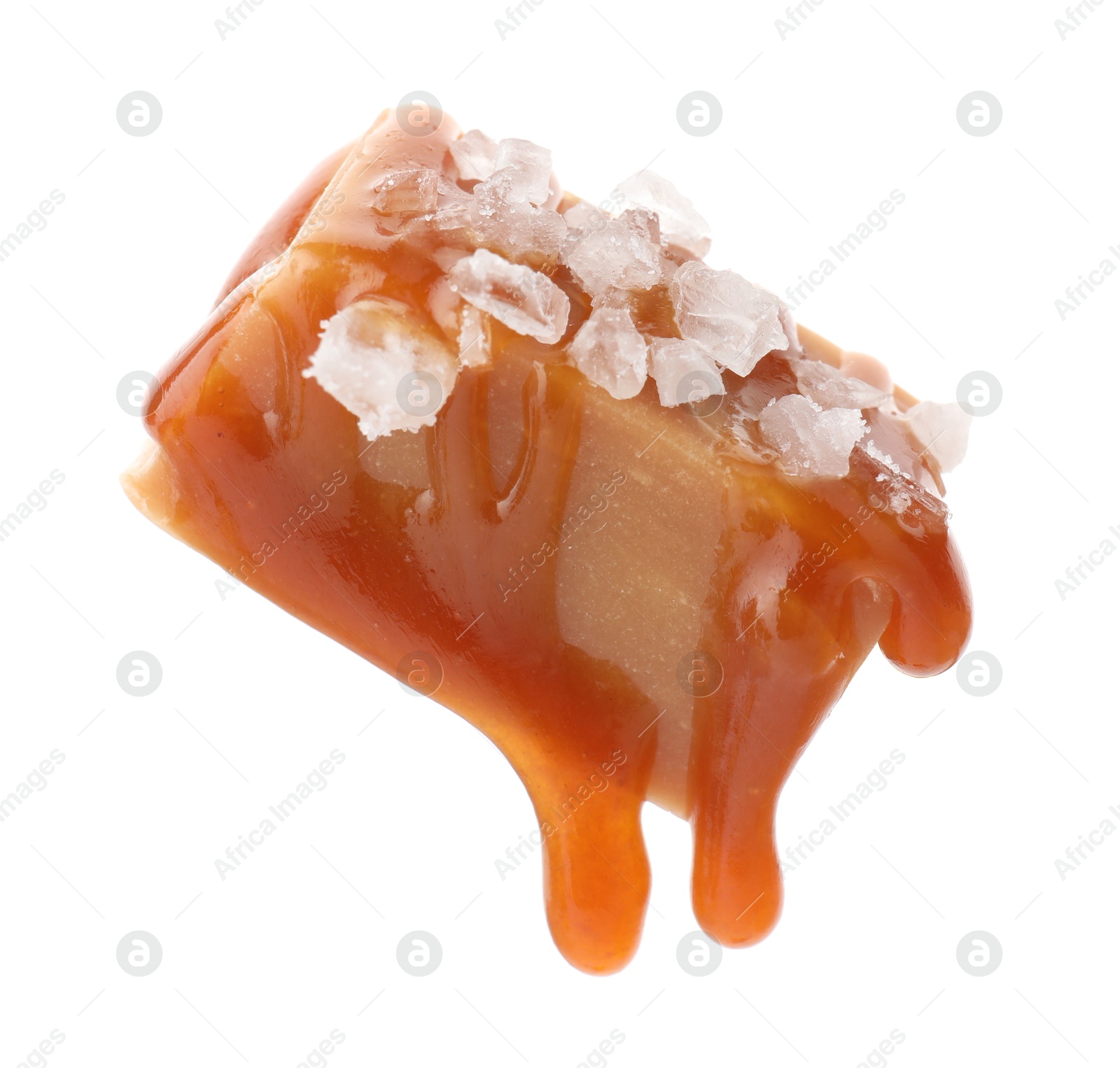 Photo of Yummy candy with salted caramel isolated on white