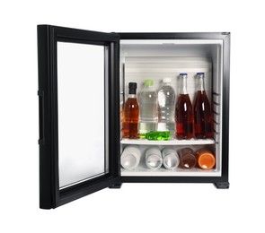 Photo of Mini refrigerator with drinks isolated on white