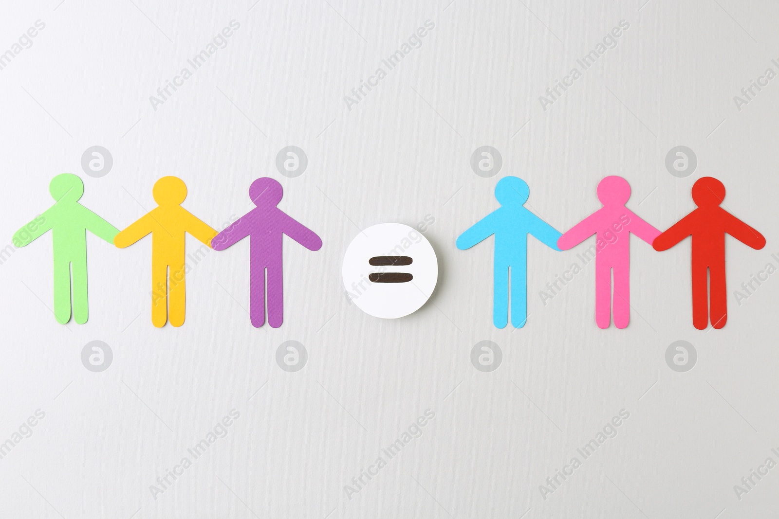 Photo of Paper human figures and equals sign on light background, flat lay