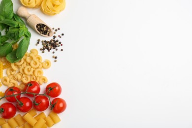 Photo of Different types of pasta, spices and products on white background, top view. Space for text