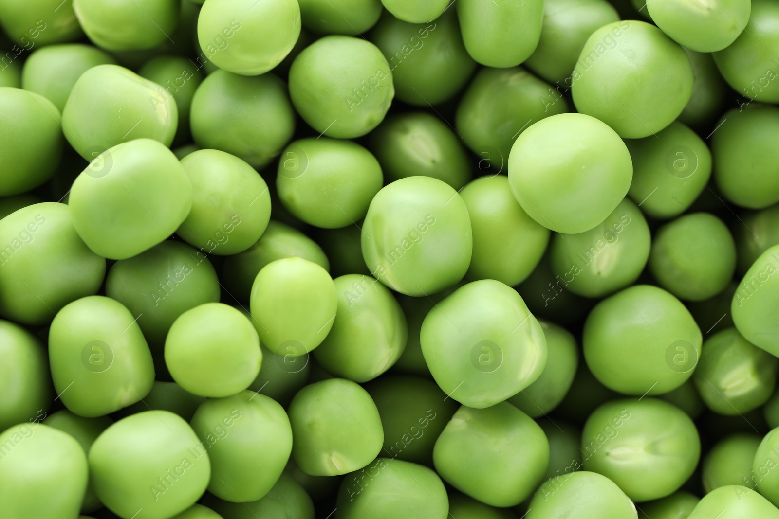 Photo of Fresh raw green peas as background, top view