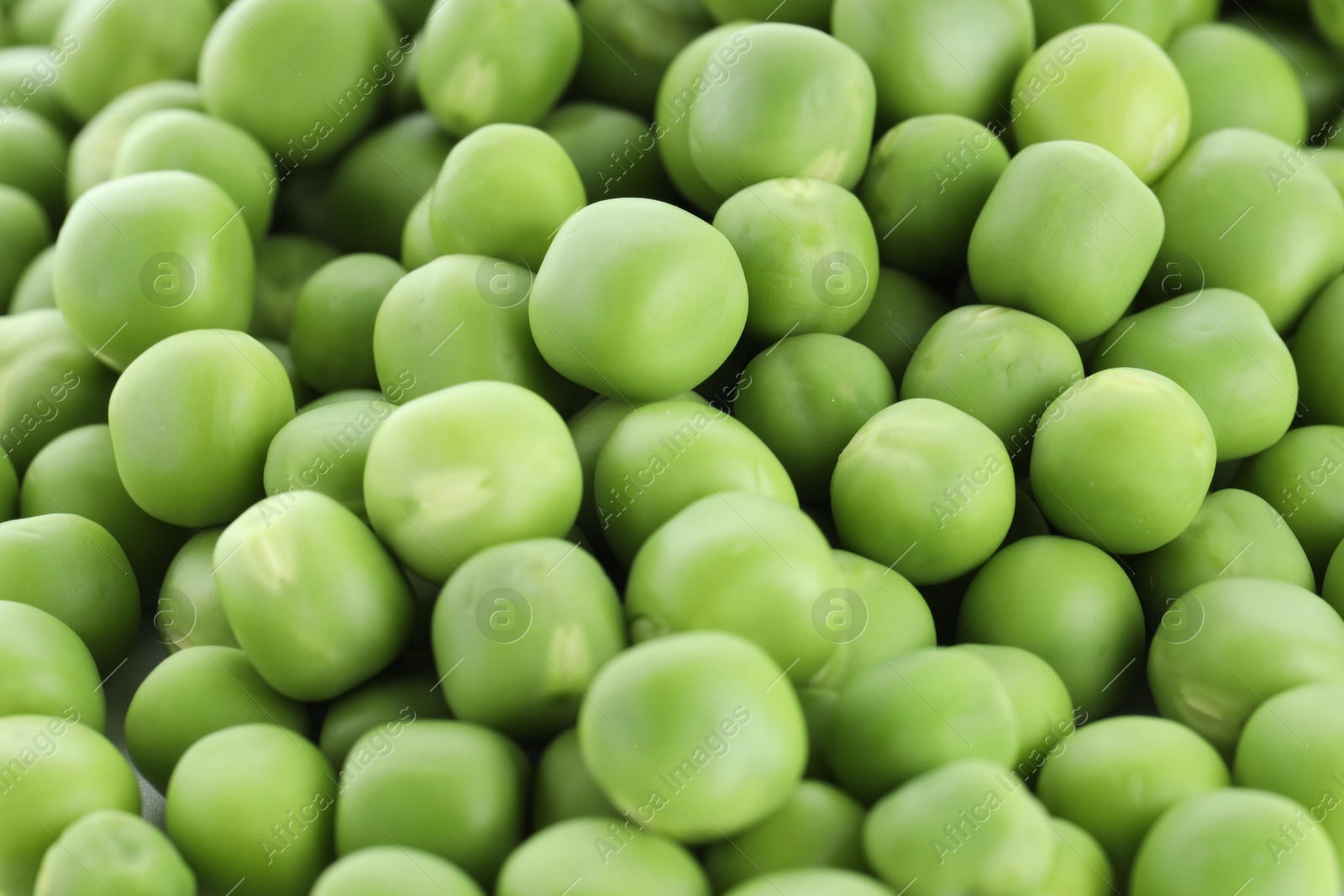 Photo of Fresh raw green peas as background, closeup