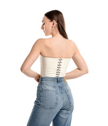 Woman in stylish corset on white background, back view