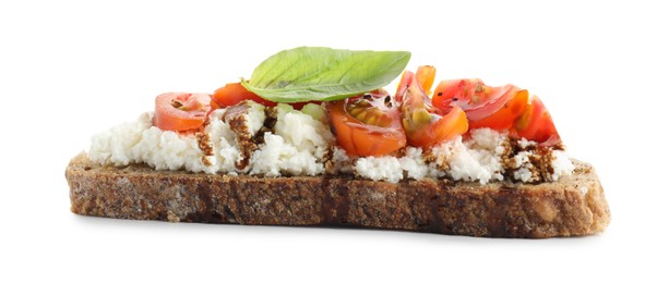 Delicious ricotta bruschetta with tomatoes, basil and sauce isolated on white