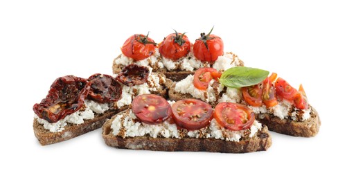 Delicious ricotta bruschettas with tomatoes, basil and sauce isolated on white