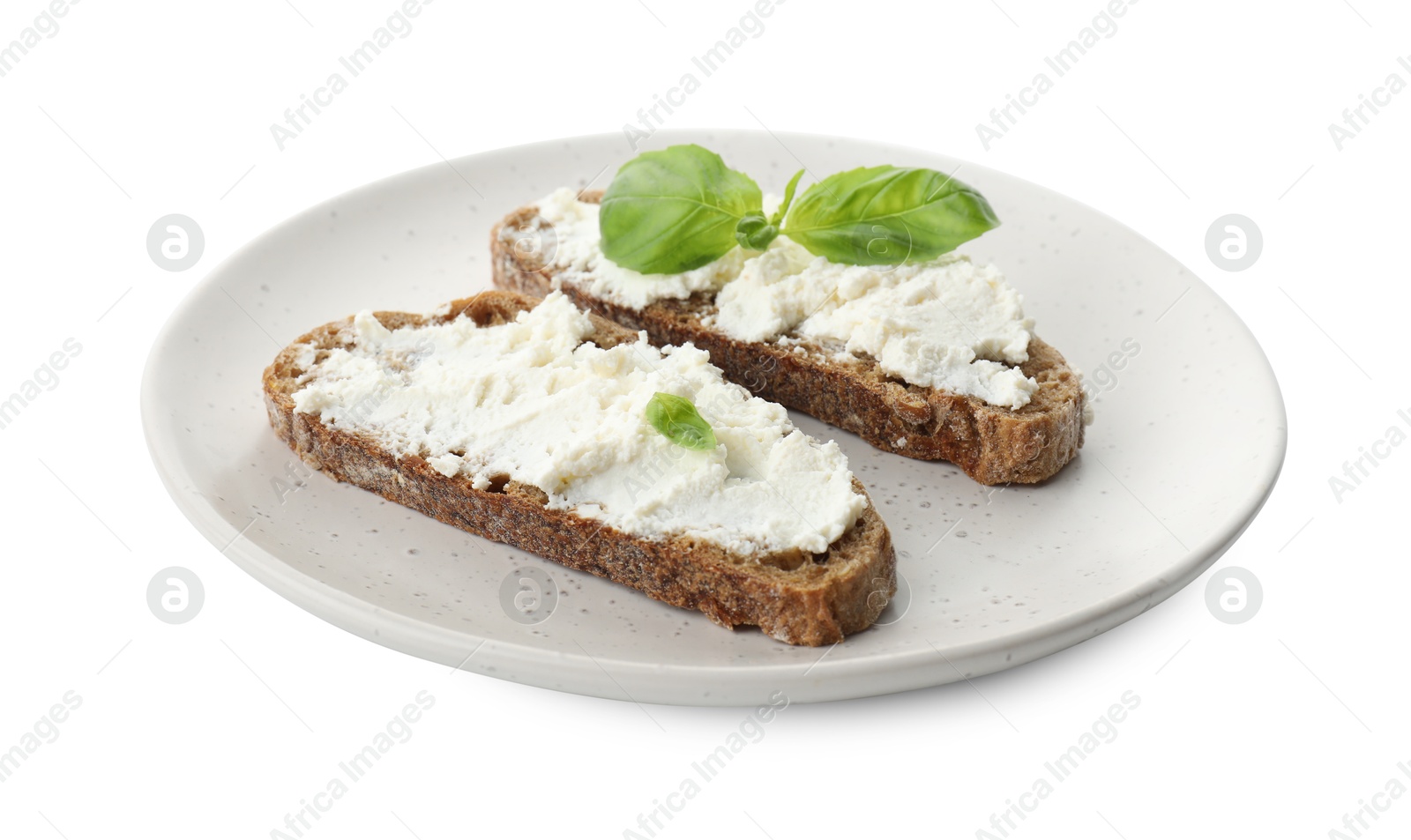 Photo of Delicious bruschettas with ricotta cheese and basil isolated on white