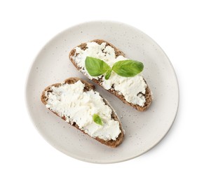 Photo of Delicious bruschettas with ricotta cheese and basil isolated on white, top view