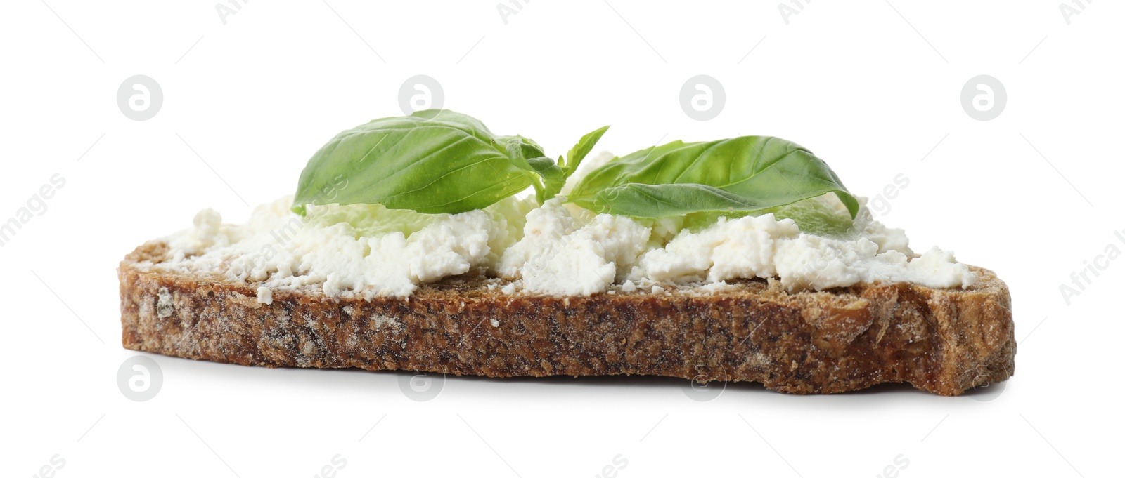 Photo of Delicious bruschetta with ricotta cheese and basil isolated on white