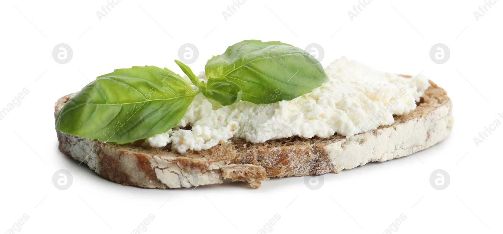 Photo of Delicious bruschetta with ricotta cheese and basil isolated on white