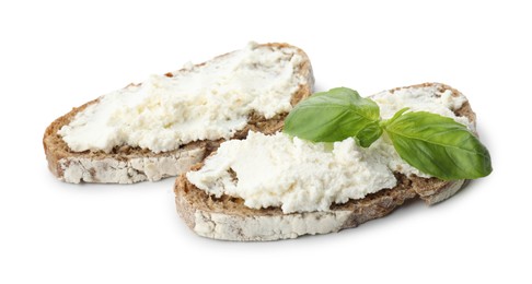 Photo of Delicious bruschettas with ricotta cheese and basil isolated on white