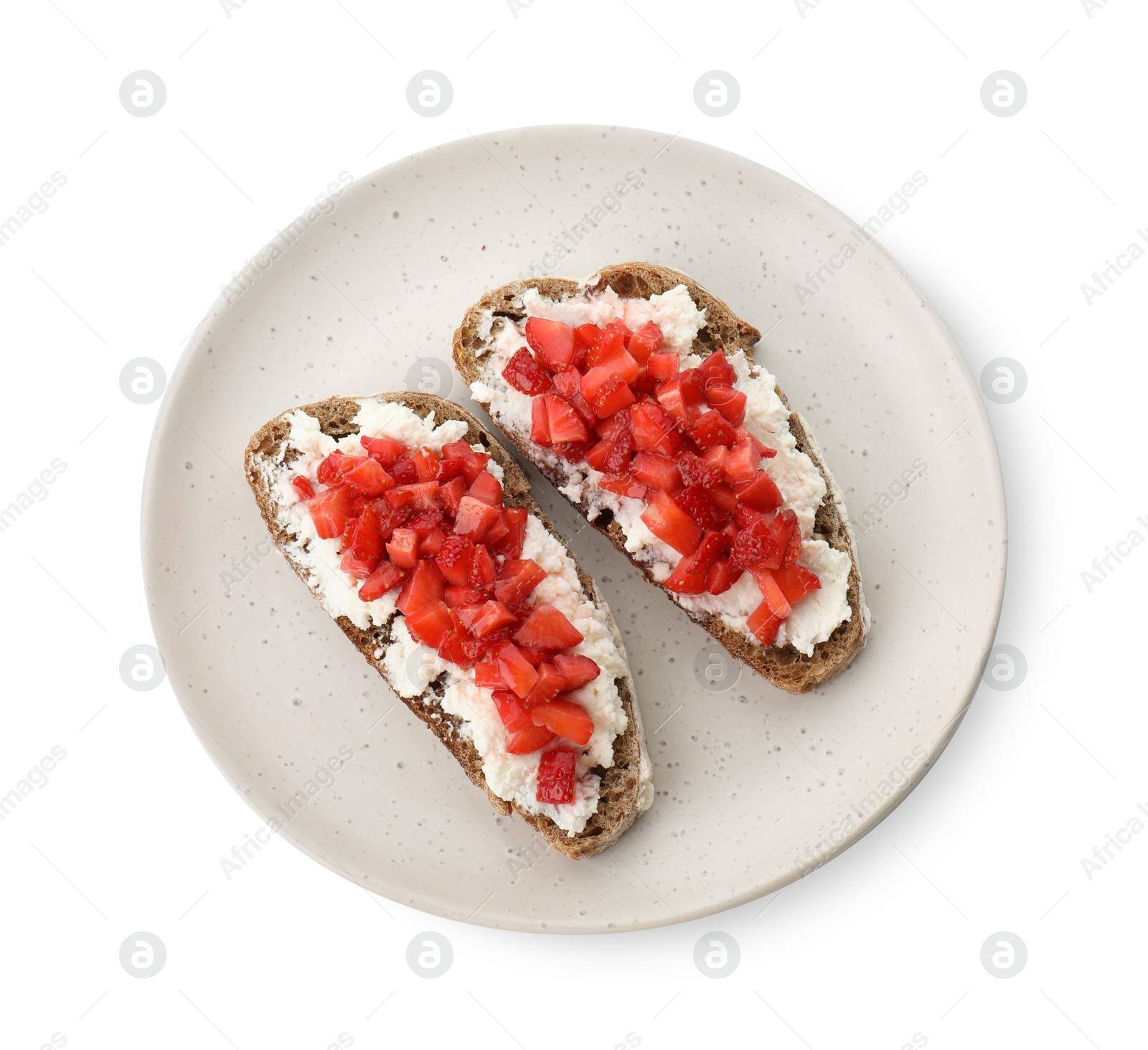 Photo of Delicious bruschettas with ricotta cheese and chopped strawberries isolated on white, top view