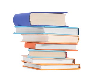 Photo of Stack of colorful books isolated on white