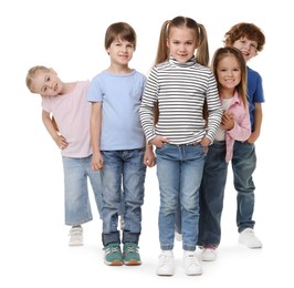 Photo of Full length portrait with group of cute children on white background