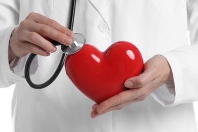 Photo of Doctor with stethoscope and red heart, closeup