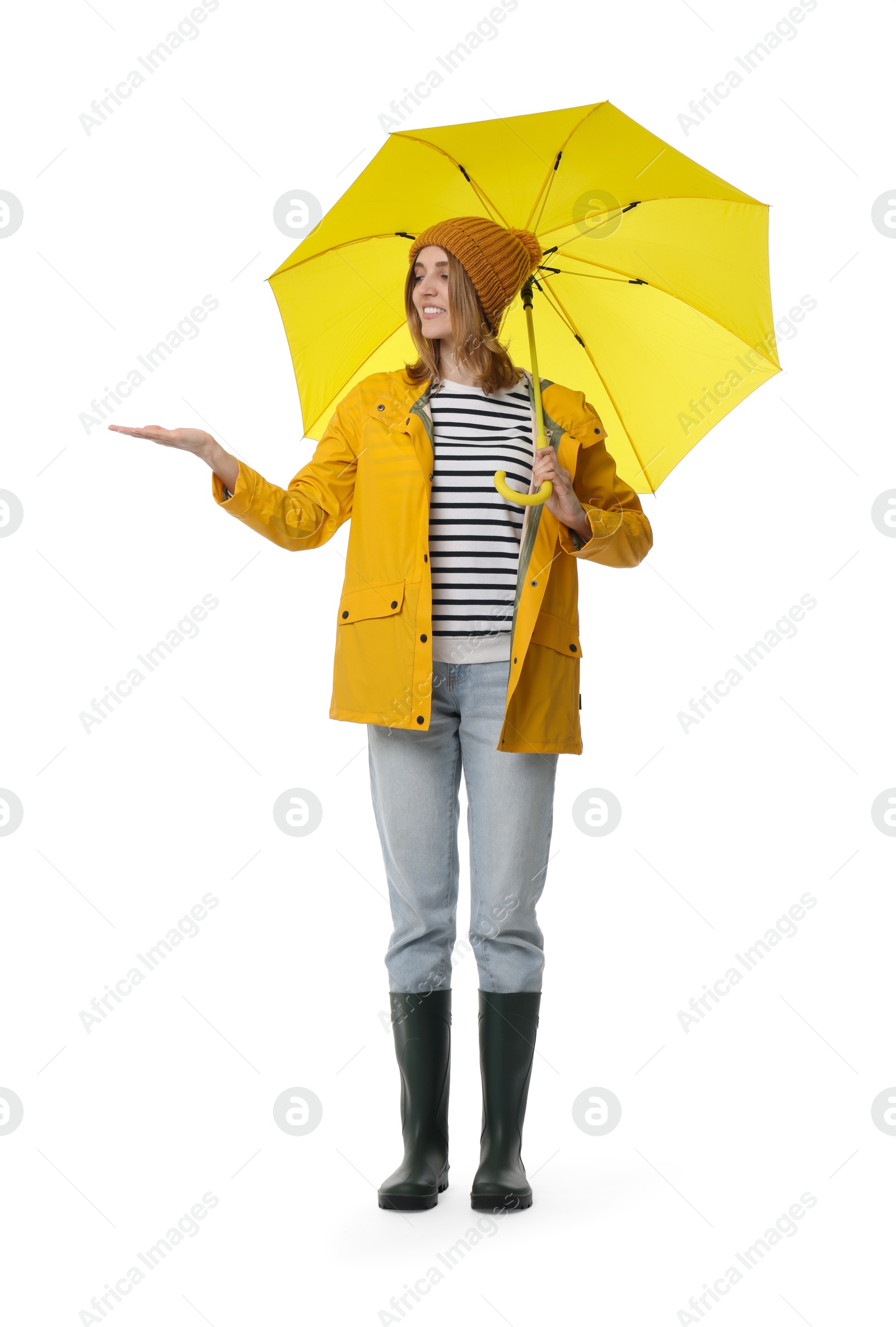 Photo of Woman with yellow umbrella on white background