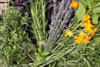 Different aromatic herbs as background, closeup view