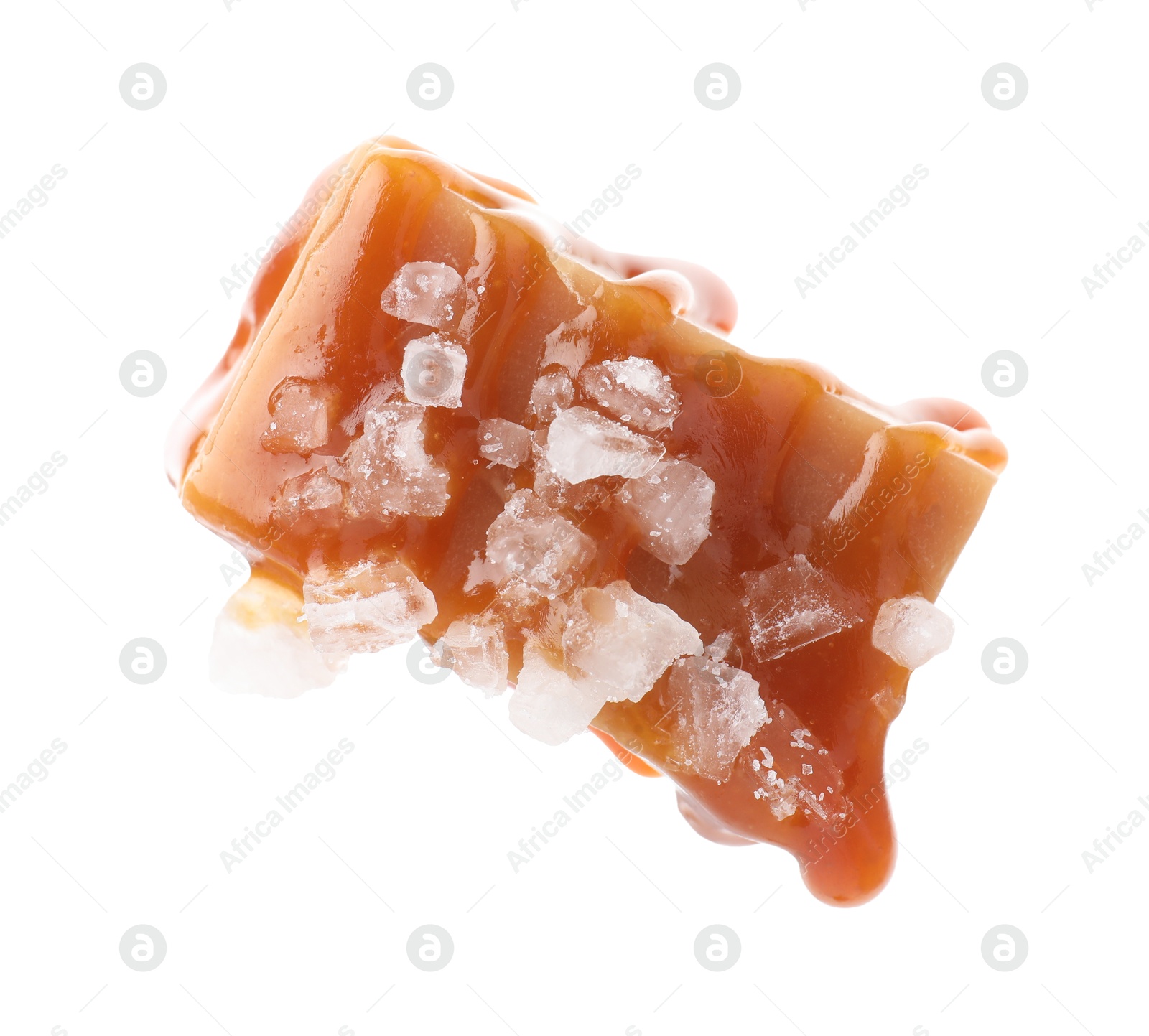 Photo of Yummy candy with salted caramel isolated on white