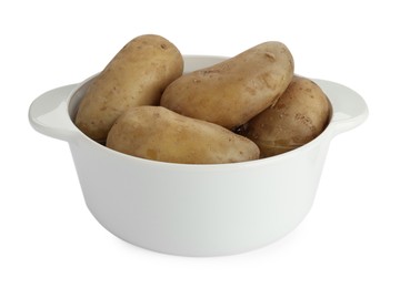 Photo of Raw potatoes in pot isolated on white