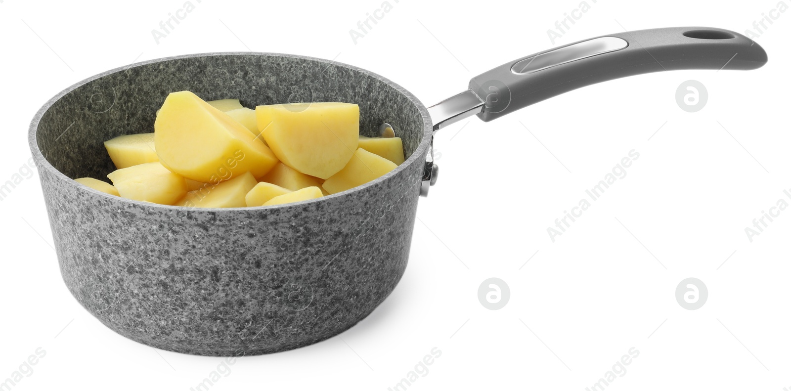 Photo of Raw potatoes in saucepan isolated on white