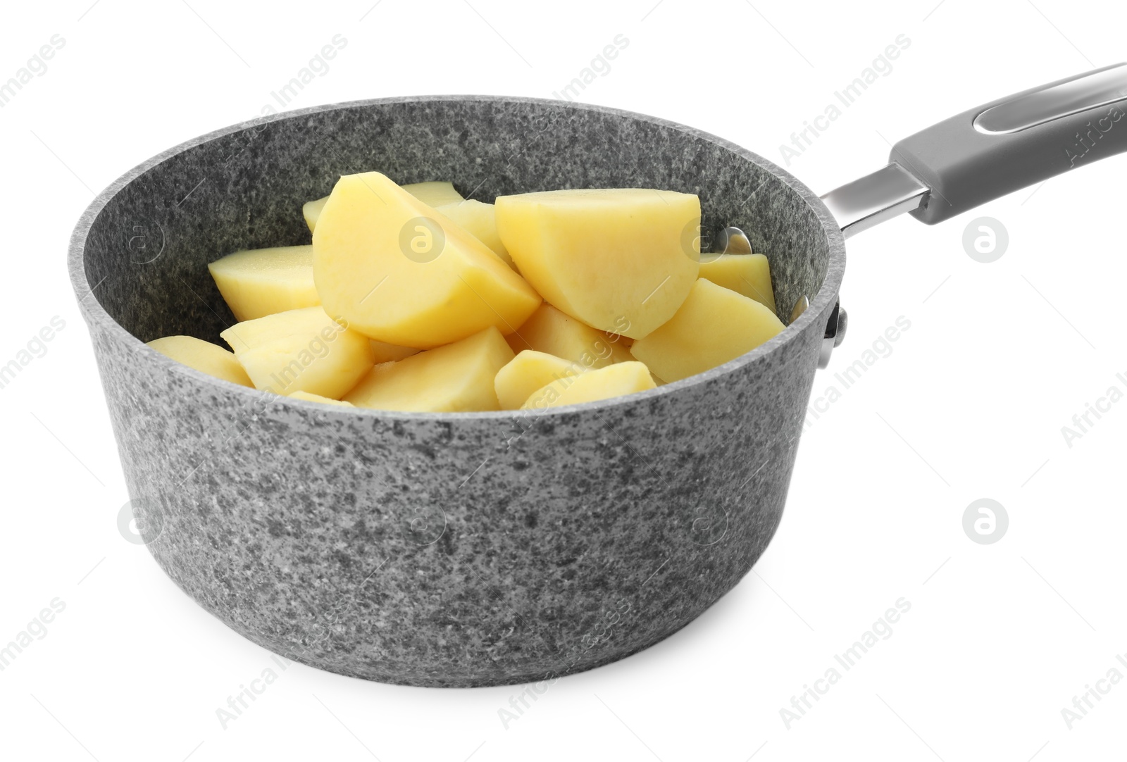 Photo of Raw potatoes in saucepan isolated on white