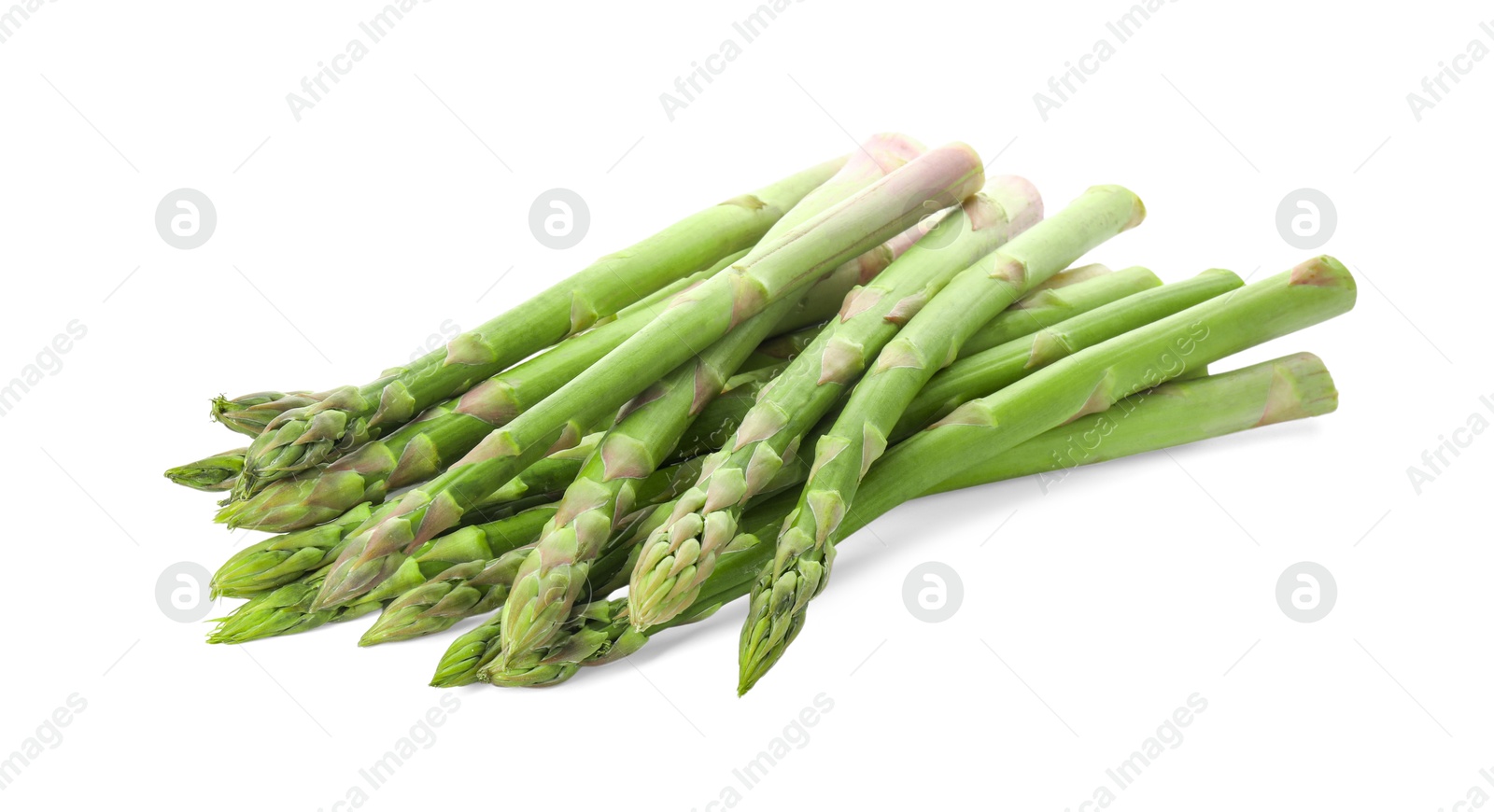 Photo of Fresh green asparagus stems isolated on white