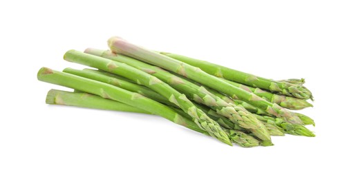 Photo of Fresh green asparagus stems isolated on white