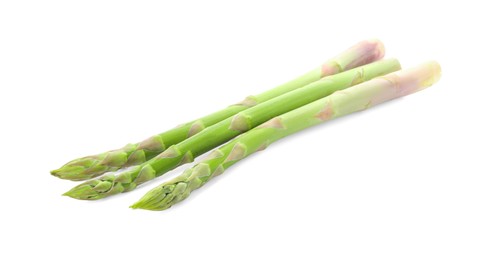 Photo of Fresh green asparagus stems isolated on white