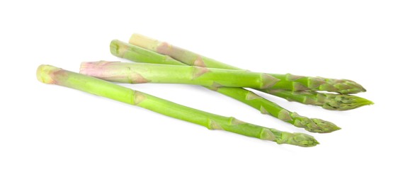 Photo of Fresh green asparagus stems isolated on white