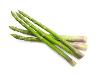 Photo of Fresh green asparagus stems isolated on white, top view