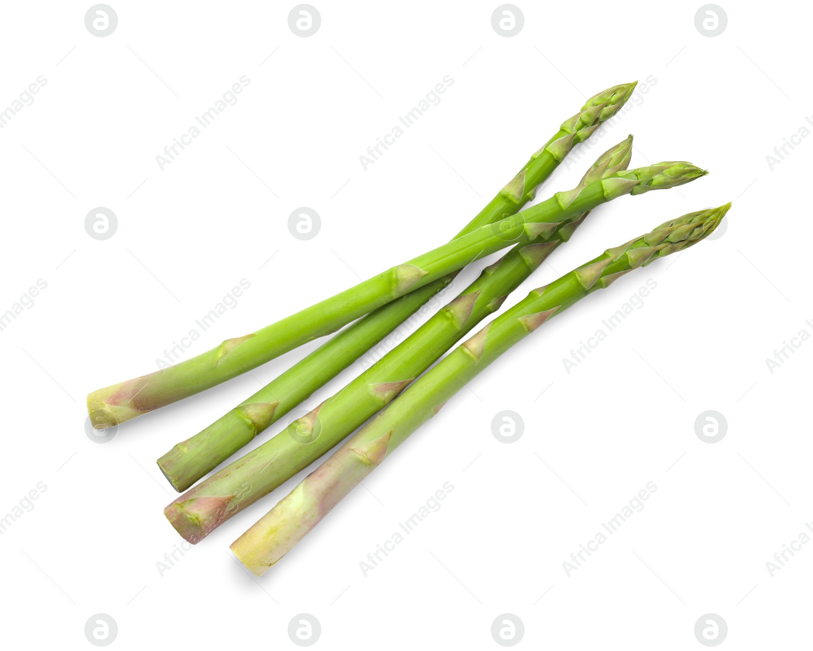 Photo of Fresh green asparagus stems isolated on white, top view