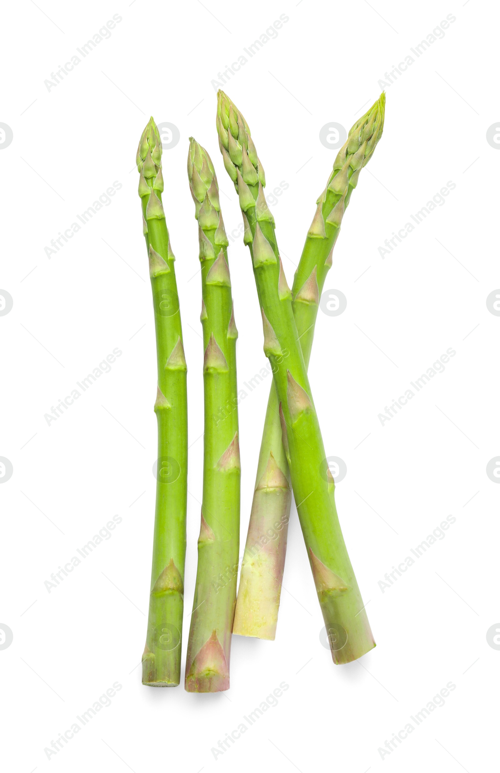 Photo of Fresh green asparagus stems isolated on white, top view