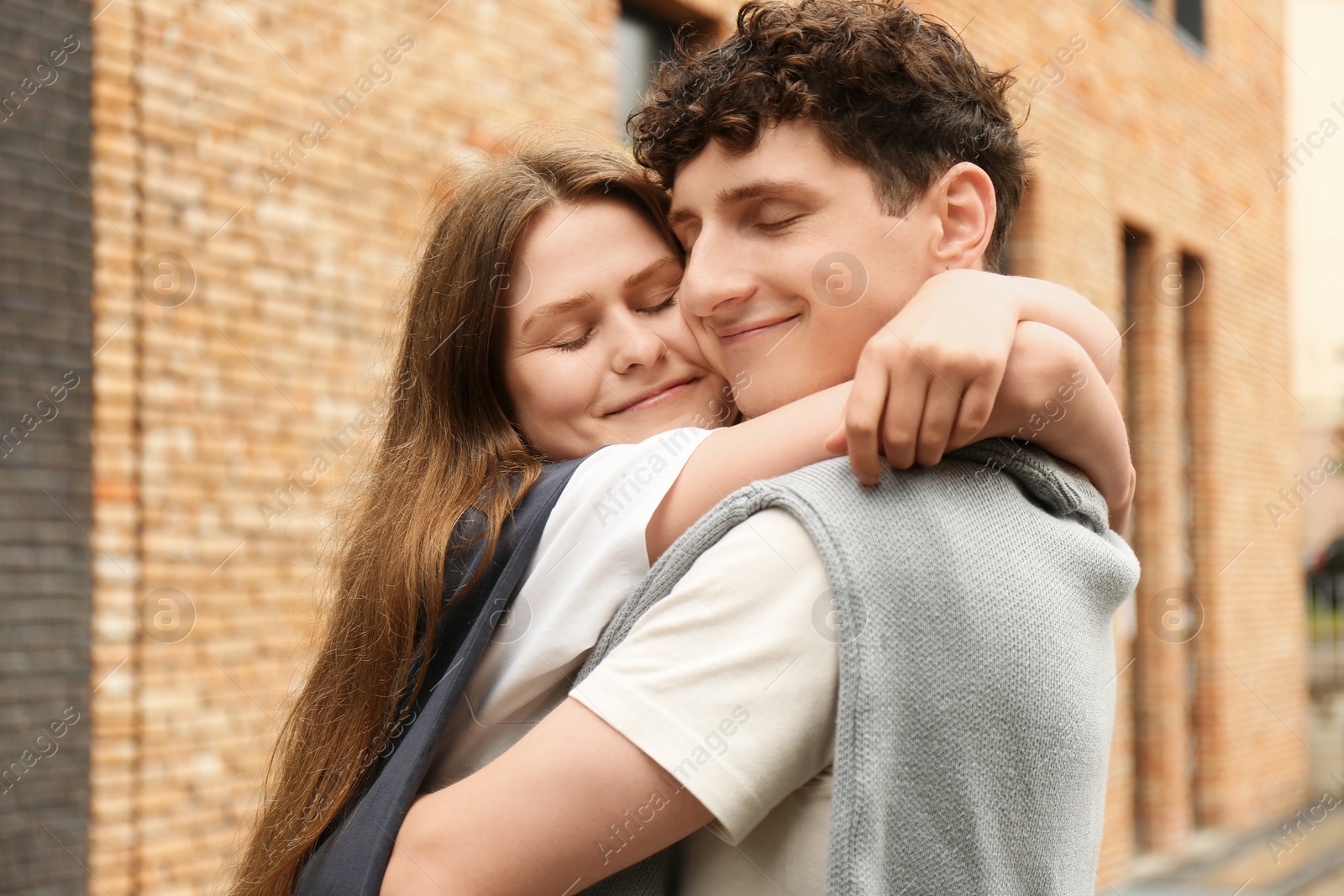 Photo of International dating. Lovely young couple spending time together outdoors